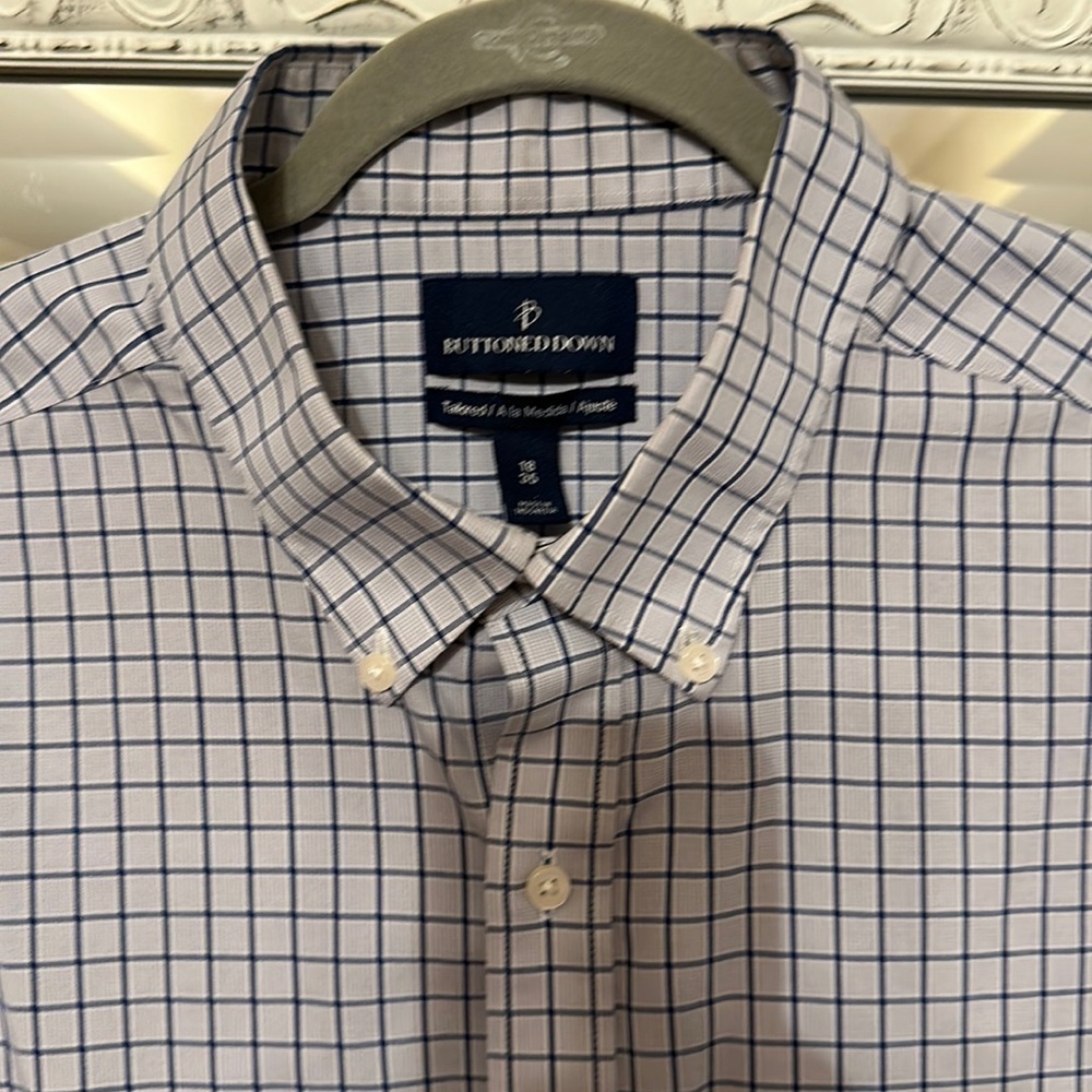 Tailored for dress shirt. Like new.
